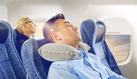 people sleeping on plane